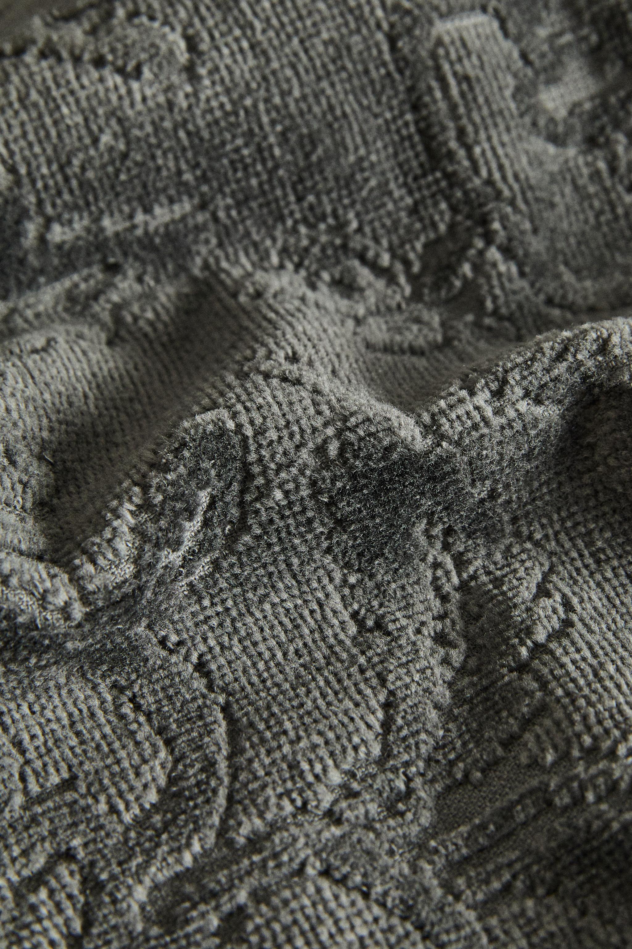 JACQUARD POMPOM BATH TOWEL